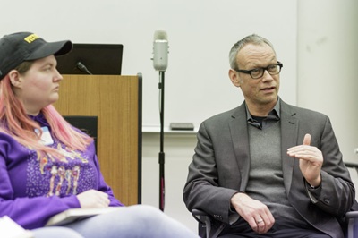 Professor Randall talking to students.